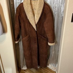 Genuine Shearling  and suede mid length coat. Made in Turkey.